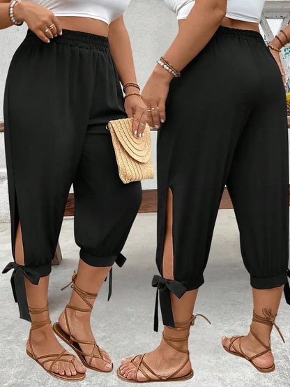 Pantalon Corsaire Large – Taille Élastique avec Fentes Latérales et Nœuds