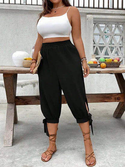 Pantalon Corsaire Large – Taille Élastique avec Fentes Latérales et Nœuds